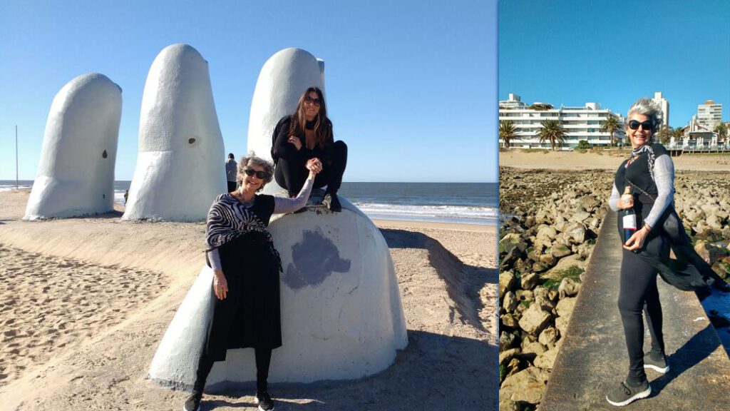 Vânia MAzzoni e Tainan na escultura Los Dedos na Playa Brava, Punta del Este Uruguai